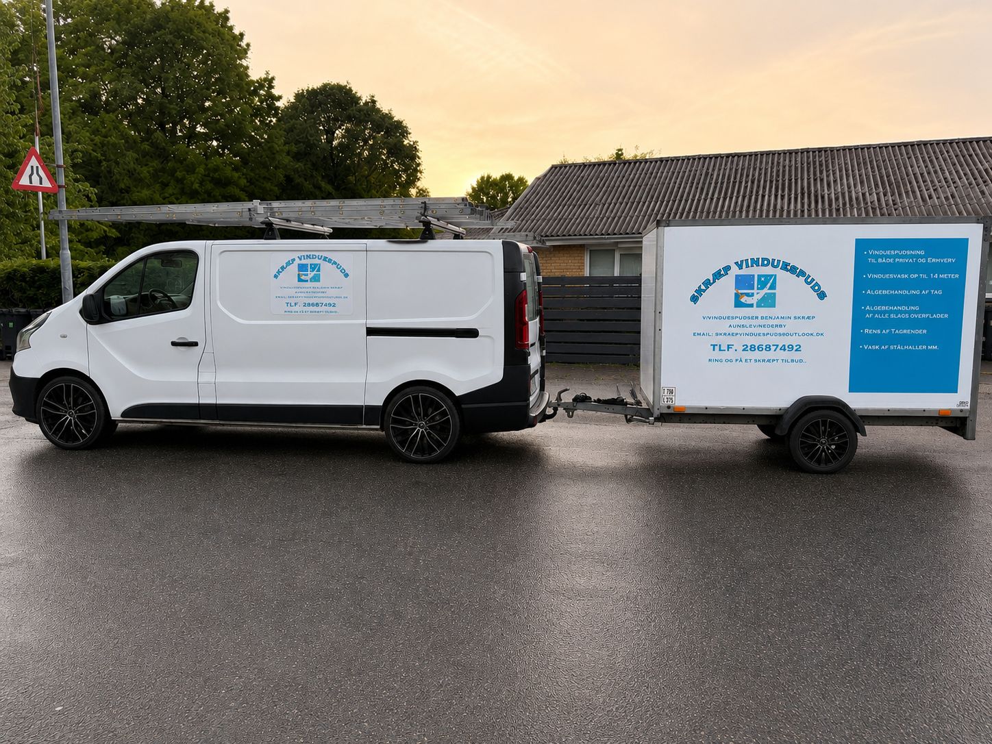 Skræp Vinduespuds i arbejde