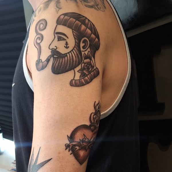 Oldschool & realistisk tatovering udført af Docuit ink