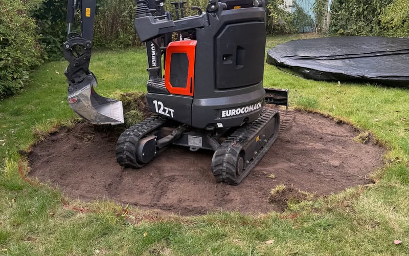 Nedgravning af trampolin udført af JT Knudsen