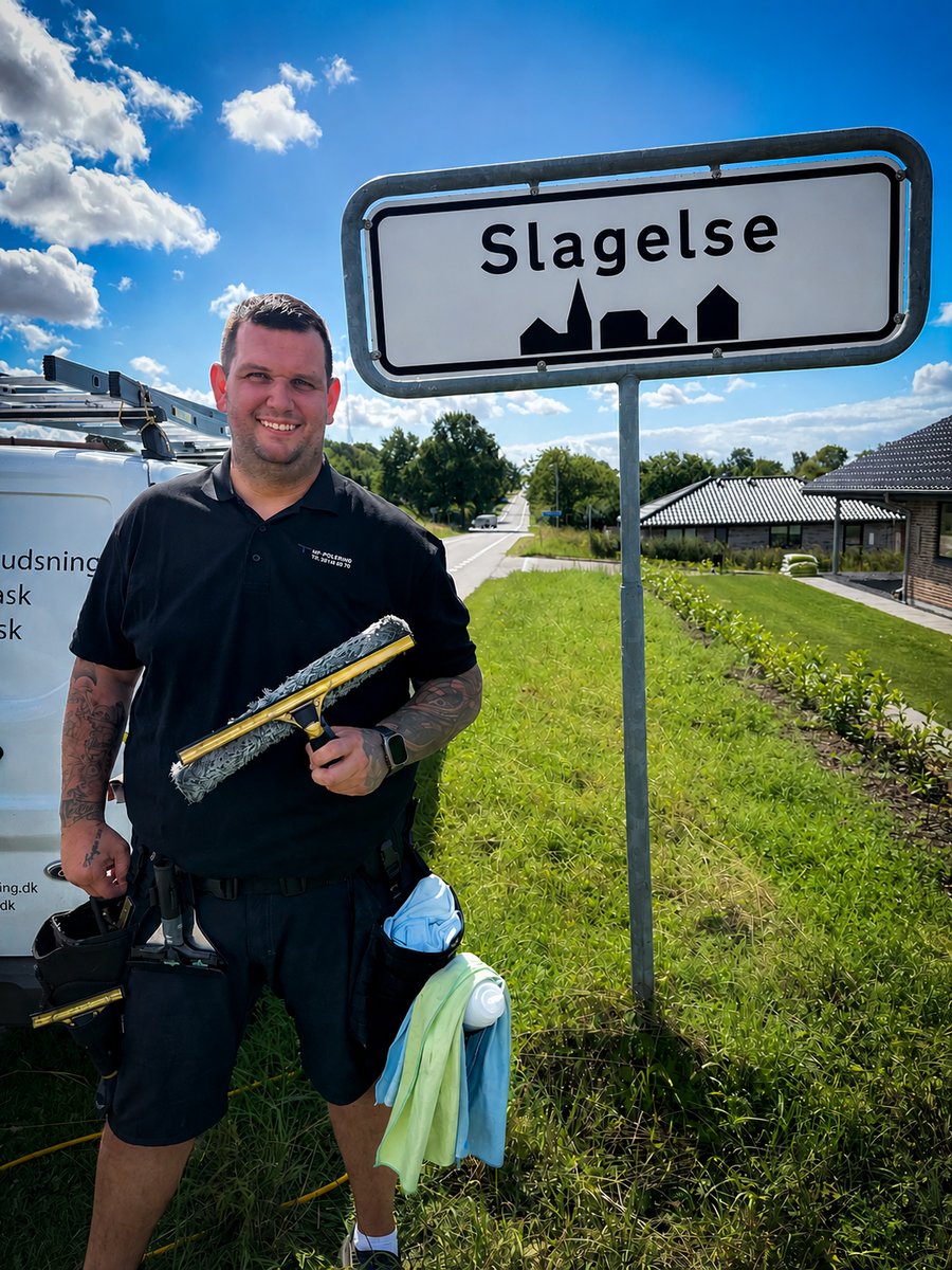 Professionel vinduespudser ved Slagelse byskilt – NF Polering